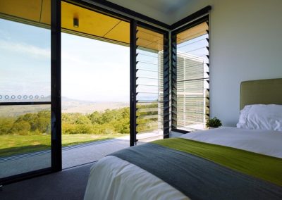 Bedroom with Breezway louver Windows